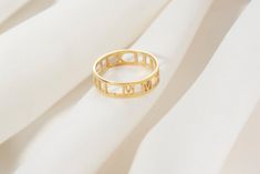 "This dainty and elegant Personalized Roman Alphabet Stackable Ring would make the perfect family birthday gift or a treat for you! PRODUCT DETAILS The material is Solid 925 Sterling Silver. Gold and rose are plated over solid 925 sterling silver. ❤ The Ring comes in a special gift box HOW TO ORDER  1- Choose your Ring color and Ring size from the drop-down menu. Available colors are silver rose gold and gold 2- Press add to cart and write your letters, numbers, symbols, into the ''PERSONALIZATI Adjustable Yellow Gold Initial Ring Gift, Elegant Gold Stackable Rings For Valentine's Day, Elegant Personalized 14k Gold Stackable Rings, Classic Gold Stackable Rings As Gift, Valentine's Day Gold Midi Rings, Hypoallergenic 14k Gold Midi Rings For Anniversary, Rose Gold Initial Ring Gift, Personalized 14k Gold Midi Rings For Wedding, Gold Stackable Rings With Initials