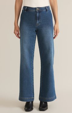 We're excited to debut this chic mid-rise wide leg trouser, crafted from premium heavyweight denim for a sophisticated look and durable feel. With patch pockets at the back, a structured waistband, and wide hem detail, these full-length trousers offer timeless style. High rise Full length Zip fly with button closure Back Pockets Midweight Wide leg Knit Denim: 92% Cotton, 7% Polyester, 1% Spandex Vintage Indigo How To Style Wide Leg Jeans, Style Wide Leg Jeans, Denim Wide Leg, Knit Denim, Vintage Indigo, Denim Trousers, Wide Leg Denim, Denim Pant, Premium Denim