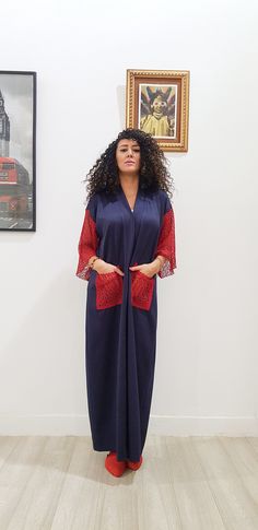 This is a very beautiful kimono ethically designed and made in Morocco. DETAILS 80% viscose, 20% elastane Navy blue with red lace arms and pockets Maxi Length 1.40 meter /55 inch One size fits all Handmade in Morocco Got a question!! don't hesitate to contact me :) Elegant Maxi Length Kimono For Festivals, Red Maxi Kaftan For Eid, Elegant Maxi Length Festival Kimono, Red Maxi Length Kaftan For Eid, Elegant Maxi Length Kaftan For Loungewear, Elegant Red Kaftan For Festival, Red Maxi Dress With Kimono Sleeves, Elegant Red Festival Kaftan, Elegant Red Kaftan With Kimono Sleeves