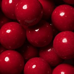 red candy balls are shown close up