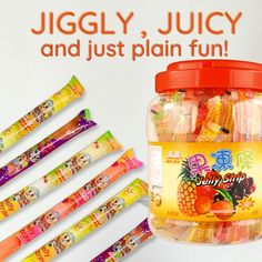 a jar filled with lots of fruit flavored candy