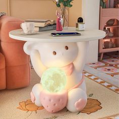 an elephant lamp sitting on top of a table