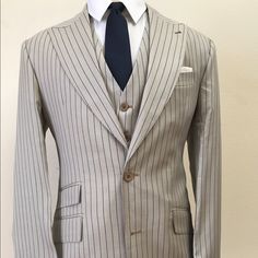 Stunning Cashmere Ivory Blue Pinstripe Super 150 Ariston Wool Suit. Ticket Pocket, 10 Inch Double Vent, 4.5 Inch Hand Stitched Peak Lapel. Flat Front Pant. Made In Italy. This Brand New Suit Will Exceed Your Expectations Or Return For Full Refund. Sells For $2600-$3200 At The Stores I Wholessle To. Elegant Fitted Suit With Vertical Stripes, Elegant Striped Three-piece Suit With Notch Lapel, Elegant Striped Three-piece Suit, Formal Striped Fitted Three-piece Suit, Striped Fitted Three-piece Suit For Formal Occasions, Fitted Striped Three-piece Suit For Formal Occasions, Elegant Striped Fitted Suit, Elegant Fitted Striped Suits, Classic Fitted Striped Suits