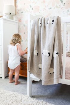 A gorgeous 100% cotton knit baby blanket featuring little woolly leaping sheep. Adorable! Features: 100cm x 70cm 100% cotton Features soft little sheep Machine washable Lamb Themed Nursery, Sheep Themed Nursery, Lamb Nursery Theme, Counting Sheep Nursery, Baby Lamb Nursery, Sheep Nursery Art, Sheep Baby Blanket, Sheep Blanket