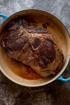 a pot with some meat inside of it