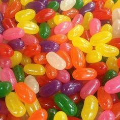 jelly beans are colorfully colored and they look as if they have been made out of candy