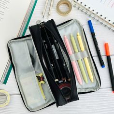 Store all your stationery tools with our large capacity 3 compartment pencil cases. Multiple compartments allows you to separate and better organize your items. The front pocket comes with slots to hold pens, pencils, colored pencils and markers. The main compartment can be used to hold larger items such as calculators, scissors, rulers, a stapler, white-out and highlighters. The back compartment comes with pockets to hold items such as sticky notes, business cards and tape. The case can also be used as a makeup bag to hold cosmetics such as brushes, lipstick, eye shadow, cream, etc. Lastly the case can be used to hold your electronic accessories such as cables, chargers, power banks, earphones and USB drives.Â 3 COMPARTMENTS: Multiple compartments for you to hold all of your items, a fron Usb Drives, Lace Tape, Pencil Case Stationery, Towel Crafts, Spa Gifts Set, Baby Hair Accessories, Power Banks, Diy Tags, Pens Pencils