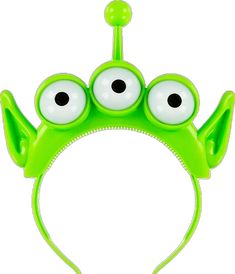 a green headband with googly eyes and two large eyes on the front of it