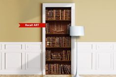 an open book shelf with books on it and a lamp in the corner next to it