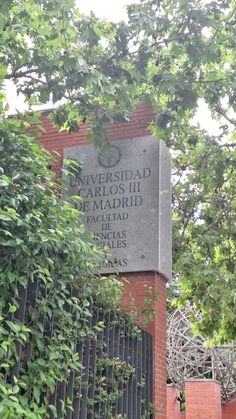 a sign on the side of a building that says liverpool united kingdom of madrid