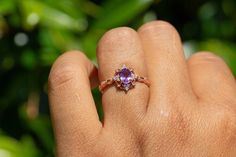 Natural Amethyst Ring, Vintage Inspired and paired with a V Shaped band, made of 10k Gold with the color of your choice Main Ring Gemtype: Natural Amethyst Main stone size: 4x6mm side Stone: D color Moissanite Metal Type: 10k Gold , color of your choice Metal Stamp: 10k Stone Origin: Brazil V shaped Band Metal Type: 10k Gold Stone: Moissanite Stone color: D Packaged in a gift ready box. Perfection takes time, please allow 2-3 weeks production time. thanks IMPORTANT: Sizes Fit True, please always Dainty Amethyst Wedding Ring With Prong Setting, Dainty Purple Amethyst Ring For Wedding, Lavender Birthstone Ring With Center Stone For Wedding, Dainty Purple Amethyst Wedding Ring, Lavender Crystal Birthstone Ring For Anniversary, Lavender Amethyst Ring With Center Stone For Wedding, Dainty Oval Amethyst Wedding Ring, Lavender Diamond Wedding Ring With Center Stone, Lavender Birthstone Ring With Accent Stones For Wedding