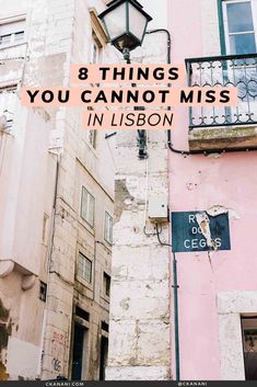 the words 8 things you cannot't miss in lisbon are above an old building