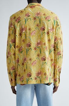 Embroidered hibiscus blooms and paisley flourishes brighten a camp shirt tailored from lightweight viscose with a straight hem to keep you untucked and casual. 29" length; 45" chest (size Medium) Front button closure Notched collar Long sleeves with button cuffs 100% viscose Dry clean Imported Designer Clothing