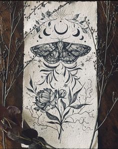 a piece of paper with a butterfly and flowers on it