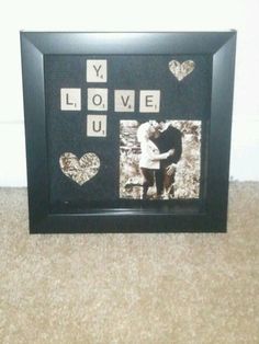 a black frame with some hearts on it