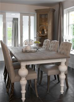 an image of a dining room table and chairs with labels on the back of them