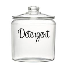 a glass jar with the word deternt written on it