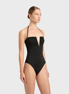 The Dahlia bandeau one piece in black features a deep V wire that offers a sensual plunge front. With feature ruching over the bust panels, Dahlia is designed to be worn either as a strapless swimsuit or as a halterneck. Dahlia Black, Australian Swimwear, Resort Wear Dresses, Strapless Swimsuit, Black Bandeau, Perfect Swimsuit, Black Features, Swimwear Brands, Designer Swimwear