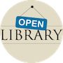 an open library sign hanging from the side of a white circle with blue lettering on it