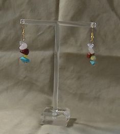 Multi-colored natural stone chipped beads earrings with gold finish.  I used similar size and shaped beads.  Each pair of earrings have different colored stones. Dangle Earrings Gold, Stone Dangle Earrings, Stone Chips, Colored Stones, Beads Earrings, Chip Beads, Gold Earrings Dangle, Earrings Gold, Gold Finish