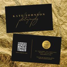 two black and gold business cards on top of a brown paper with the words, kate johnson photography