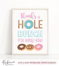 a sign that says thanks to a hole punch for being here with donuts on it