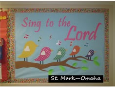 a bulletin board with birds and music notes on it that says sing to the lord