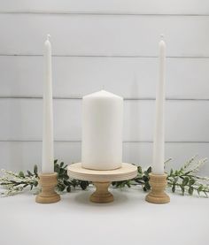 You will receive a 3 Piece Unfinished Candle Holder set: 2 Smaller Taper Candleholders: 2" tall x 1.25" wide each 1 Center Candleholder: 2.25" tall x 5" wide top DIY, You can paint these wooden Candle Holders any color or stain to match your Event. You can add Bling, Gem Stones, Ribbon, Rope, Shells or anything to the 0.5" edges Unfinished, Undecorated 3 Piece Wooden Unity Candle Set (Candles and Flowers are not included) A Beautiful addition to your Wedding and Special Event Tables! They arrive Unity Candle Outdoor Wedding, Unity Candle Table, Unity Candle Alternatives Unity Braids®, Wedding Ceremony Unity Candle, Candles And Flowers, Event Tables, Unity Candle Set, Candle Wedding Decor, Happy Painting