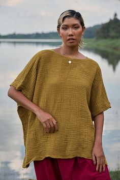 🚚..ALL ORDERS ARE SHIPPED VIA DHL EXPRESS MAIL Basic, loose caftan top with round neck line and generous caftan sleeves. Excellent basic piece that looks good on almost any shape. A must have! DETAILS: ▪ Pull-on style ▪ Crew neck ▪ Dropped shoulder ▪ Caftan sleeves ▪ Side slits ▪ Prewashed, Preshrunk MEASUREMENTS: Sleeve Length (from side of neckline): 14" (36 cm) Armhole: 24" (61 cm)- round Bust: 66" (168 cm- all around) Hips: 66" (168 cm- all around) Approx. kaftan length from shoulder to hem Short Kaftan Tops, Kaftan Tops, Beach Kaftan, Short Kaftan, Cotton Caftan, Bohemian Tops, Neck Line, Sewing Inspiration, Dhl Express