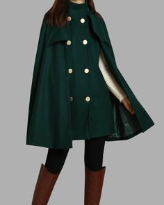 * A cool and long wool cape coat with hood, very elegant. * With double row gold color buttons and two pockets, fully lined. * If you want black buttons, please let us know, thanks. * Stand up collar, more warmer. * Material: out shell - 50% wool, 50% polyester; lining - 100% polyester * Care: dry cleanable * Shop sizing chart FYI ( made according to US sizing. actual body figures, not laying flat clothes measurements) Size XS (US 2, UK 6, German 32, French 34, ) Bust: fits bust around 33.5 inch Cape With Arm Holes, Cape Coat Outfit, Coat With Cape, Vintage Cape Coat, Capelet Coat, Winter Cape Coat, High Neck Coat, Mantel Cape, Wool Cloak