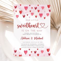 a card with hearts on it and the words, our little sweetheart is on the way