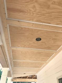 a close up of a wooden roof on a house