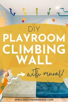 the playroom climbing wall is painted yellow and blue with words reading diy playground climbing wall