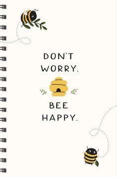 a notebook with the words don't worry bee happy on it and two bees flying around