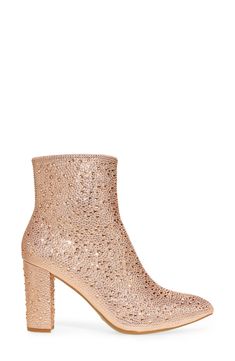 Instantly elevate any outfit with this dazzling side-zip bootie finished with a pointy toe and covered in a symphony of glittering crystals. 3 1/2" heel 5 1/4" shaft Synthetic upper, lining and sole Imported Guy Shoes, Pointy Toe Boots, Rose Gold Glitter, Gold Glitter, Bootie, Side Zip, Brazil, Womens Boots, Shoes Mens