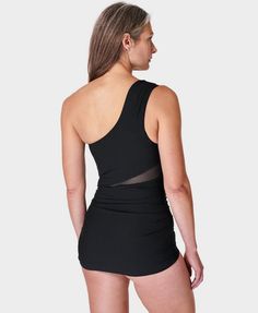 Our ultra-flattering new swimsuit with an asymmetric silhouette. Part-recycled, super-sculpting fabric is double layered for increased support. Feminine shape with ruching, mesh inserts and medium cut legs. Resistant to damage from chlorine . In-built bra support and padding. Centre front length: 65.5cm / 26”. Model wears size S and is 178cm/5'10" tall. Style Code: SB9631Colour: Black Sleeveless Stretch Mesh Swimwear, Summer Swimwear With Built-in Bra And Mesh Material, Mesh Swimwear With Built-in Bra For Summer, Sleeveless Mesh Swimwear With Lined Body, Stretch Nylon Swimwear With Ruched Sides, Beachwear Swimwear With Asymmetrical Neckline, Nylon Stretch Swimwear With Ruched Sides, Party Swimwear With Ruched Back And Stretch, Party Swimwear With Ruched Sides And Stretch