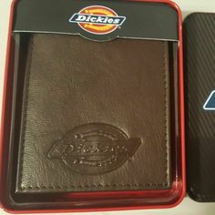 Dickies Billfold Wallet Brown Leather Style 31ip220002 Color Brown New In Tin Description: Get The Durability You Need From A Billfold With This Dickies Leather Wallet. It Has An Attractive Matte Finish That Sets It Apart From Standard Shiny Pieces. This Men's Leather Wallet Is Double Stitched For Reinforced Strength. There Are Six Slots For Holding Your Driver's License, Debit Cards, Work Id And More. The Oversized Slots Are Ideal For Carrying Cash And Other Items. The Extra Card Flap Folds Dow Casual Brown Trifold Wallet With Interior Card Slots, Brown Trifold Wallet With Id Window, Casual Rectangular Wallet With Coin Pocket, Casual Leather Wallets For Daily Use, Casual Trifold Wallet With Card Slots As Gift, Casual Trifold Wallets For Everyday Use, Casual Trifold Wallet For Daily Use, Casual Leather Trifold Wallet, Casual Bifold Wallets With Coin Pocket