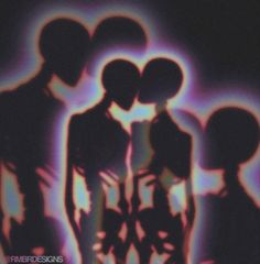 the silhouettes of three people in front of an abstract background