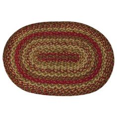 the oval rug is shown in red and beige, with an oval design on it