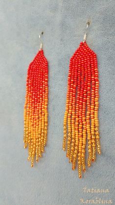 These handmade earrings are made of high-quality Czech beads and strong synthetic thread. They are elegant, fashionable, and highly versatile, suitable for everyday wear. Color: red, orange. There may be some color discrepancies which is due to the different monitor settings 100% hand made with love! Measurements: Length-about 11cm (4.3 inch) Width -about 2 cm (0.79 inch) Materials: Sterling silver components Czech glass beads Strong bead weaving thread Red Fringe, Beading Patterns Free, Orange Earrings, Earrings Red, Gifts For An Artist, Earrings Long, Seed Bead Earrings, Czech Beads, Fringe Earrings