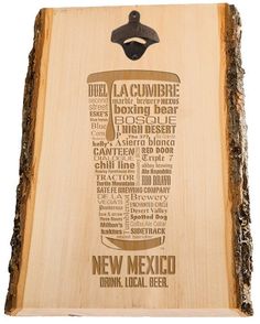 a wooden plaque with the words michigan on it and an image of a glass bottle