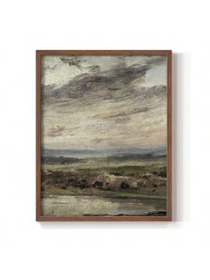 a painting hanging on the wall next to a white wall with a brown frame and an image of a cloudy sky