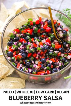 blueberry salsa in a bowl with tortilla chips