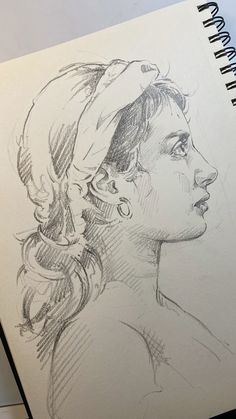 a drawing of a woman's profile with her hair pulled back and wearing a bandana