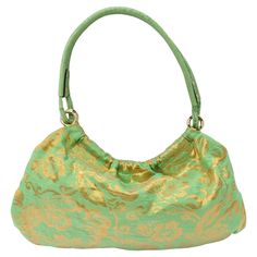 Introducing the Kate Spade Green Floral Shoulder Bag, a vibrant and playful accessory that adds a touch of fun to any ensemble. This bright green shoulder bag features metallic gold floral detailing, adding a whimsical and eye-catching element to its design. The crocodile embossed green leather strap adds a luxurious touch to the bag, while the Y2K-inspired style adds a nostalgic charm. With its bold color and playful floral accents, this shoulder bag is sure to turn heads and make a statement w Kate Spade Spring, Kate Spade Designer, Kate Spade Green, Balenciaga Leather, Leather Clutch Bags, Black Leather Bags, Handbag Straps, Leather Chain, Kate Spade Bag