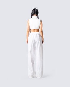 When you can still slay even with a casual, comfy fit > 💅🏽 Give them something they can't compete with in this white cropped knit top and parachute pant set 🤍 White Cropped Hem Crop Top For Spring, Stretch Parachute Pants For Summer Loungewear, Trendy White Wide-leg Parachute Pants, Casual Crop Top With Elastic Waistband For Day Out, Chic Relaxed Fit Crop Top For Loungewear, White Crop Top For Loungewear In Spring, White Cotton Crop Top With Cropped Hem, White Parachute Pants With Elastic Waistband For Loungewear, White Casual Two-piece Top Set