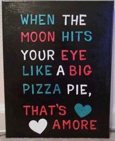 a sign that says when the moon hits your eye like a big pizza pie, that's amore