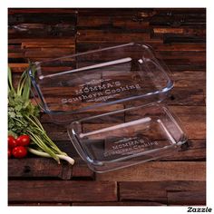 two glass containers with tomatoes and onions on a wooden table next to some other vegetables