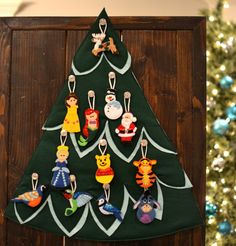 a christmas tree made out of felt ornaments