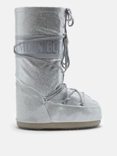 silver-tone glitter detailing water-repellent padded design logo-print strap front lace-up fastening metal eyelet detailing full lining top drawstring fastening round toe calf-length flat rubber sole Glitter Boots, Mule Sneakers, Moon Boot, Low Boots, Moon Boots, Silver Logo, Baby Boots, Snow Boots Women, Ski Boots